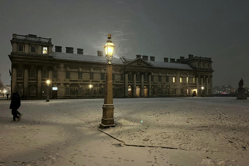 The Grand Square of the Old Royal Naval College, Greenwich, at night in the snow